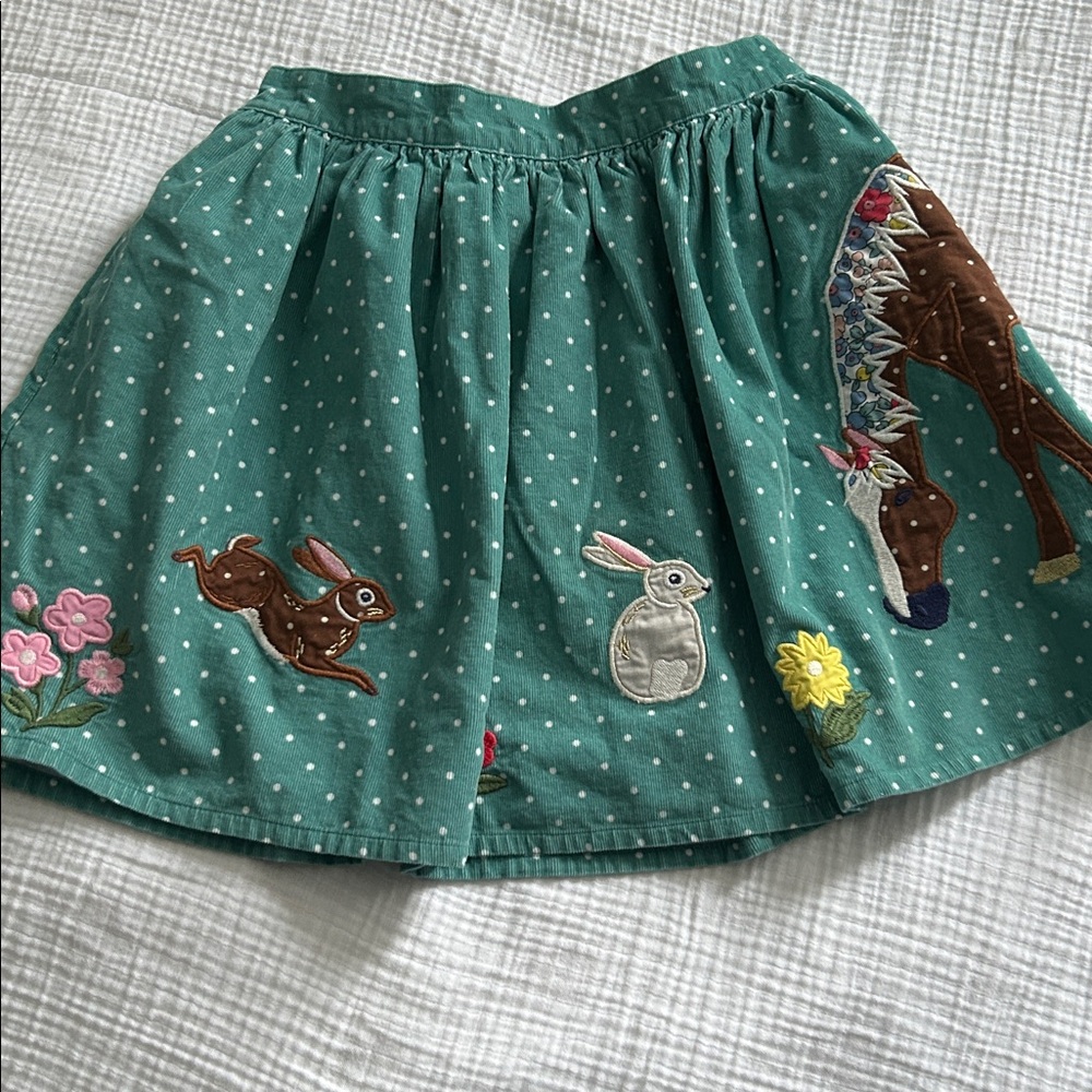mini Boden size 11-12 years corduroy appliqué skirt w/ floral liner. EUC